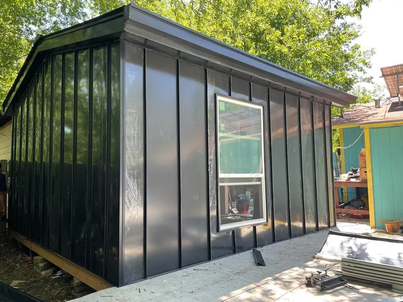 Black standing seam metal wall panels for Metal Roof Installation in Waterbury