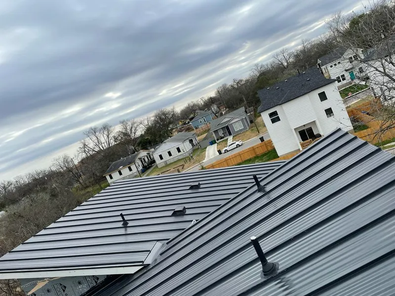 Standing seam metal roof panels with vents for Skylight Repair in Waterbury